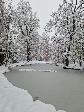 Adventní trh na Hradišti 2023 - zasněžený zámecký park nahled